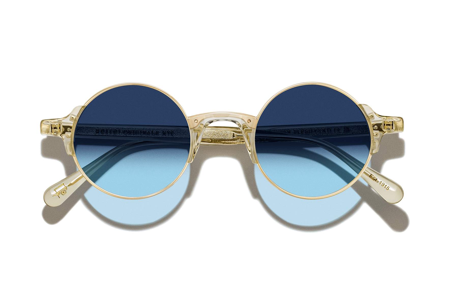 oh_sun_dibbik-sun-_flesh-gold-denim-blue-lenses_outw